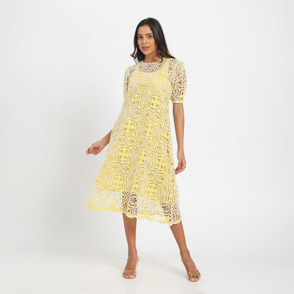 Pale yellow cutwork dress