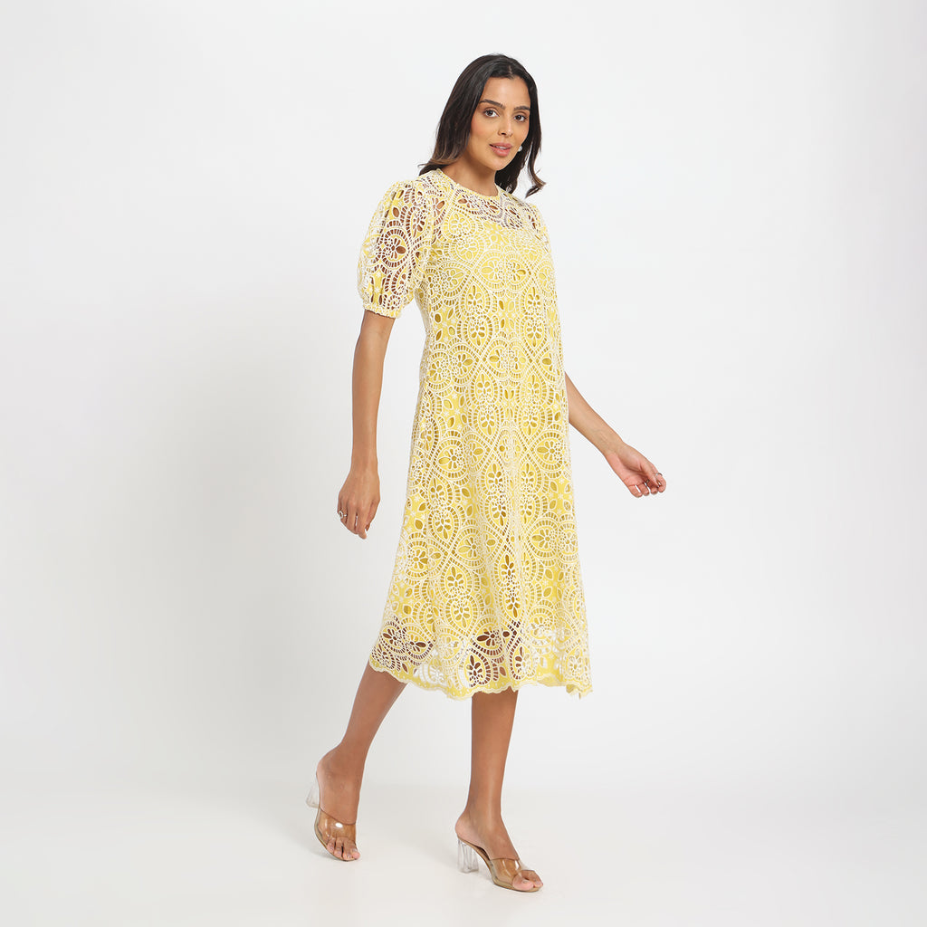 Pale yellow cutwork dress