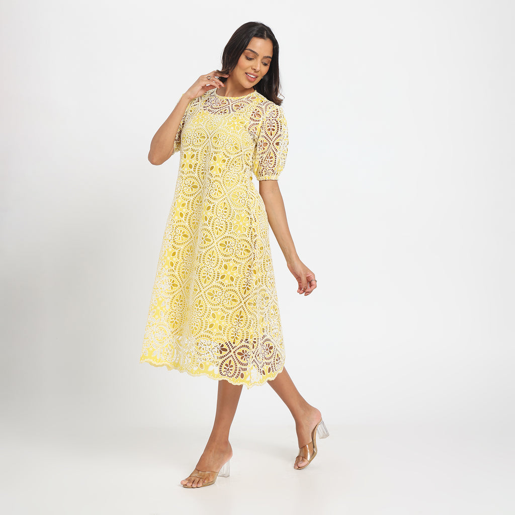 Pale yellow cutwork dress