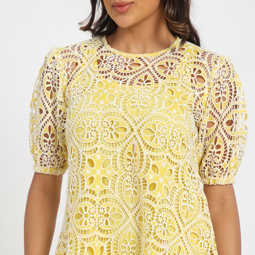 Pale yellow cutwork dress