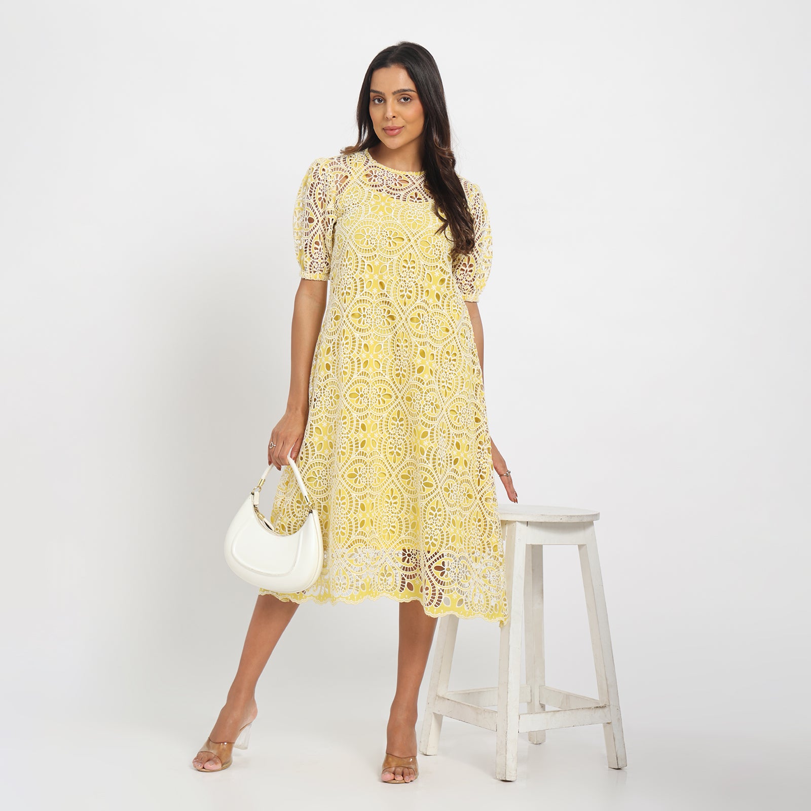 Pale yellow cutwork dress