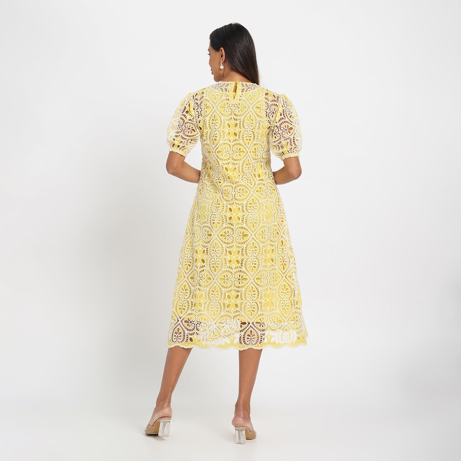 Pale yellow cutwork dress