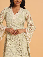 Pistachio green lace mini dress