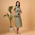 Solid green A line dress with bag